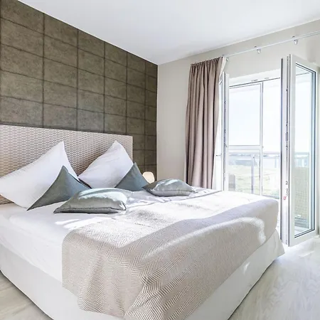 Апартаменты Duenenlounge - 5 Sterne Mit West-balkon Und Fantastischem Blick Ueber Den Deich Вустров